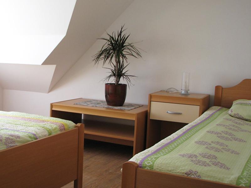 Spalnica v zelenem apartmaju